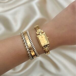 AUTHENTIC RARE VINTAGE GIVENCHY GOLD WATCH - WITH DIAMOND HOUR MARKERS